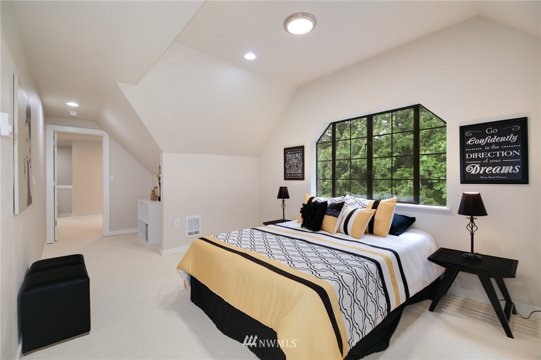 28505 Northeast Tolt Hill Road Carnation, WA 98014 - Photo 18 of 25 a bedroom with double bed and a large window