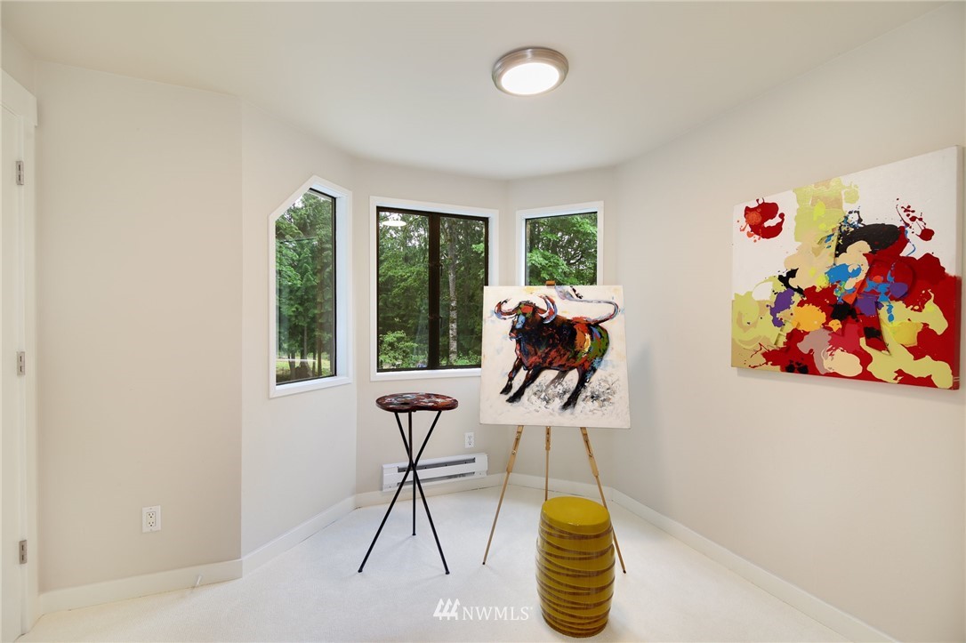 28505 Northeast Tolt Hill Road Carnation, WA 98014 - Photo 19 of 25 a work room with furniture and a potted plant