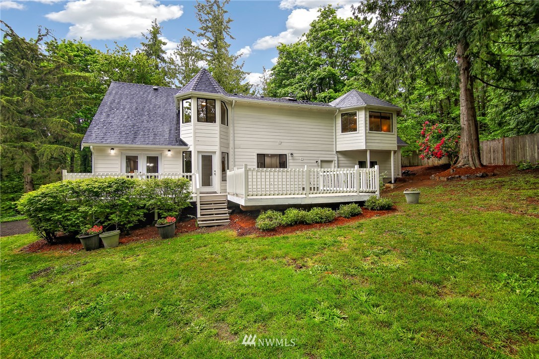 28505 Northeast Tolt Hill Road Carnation, WA 98014 - Photo 3 of 25 a view of a house with a yard and sitting area