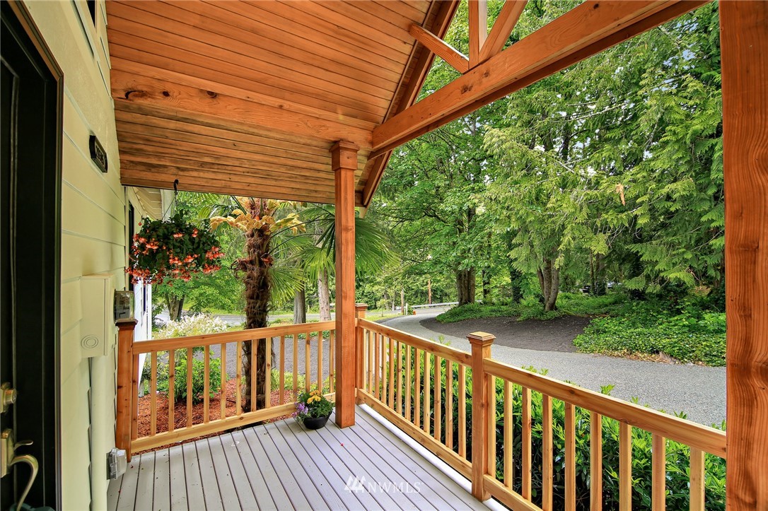 28505 Northeast Tolt Hill Road Carnation, WA 98014 - Photo 5 of 25 a view of a balcony with wooden floor