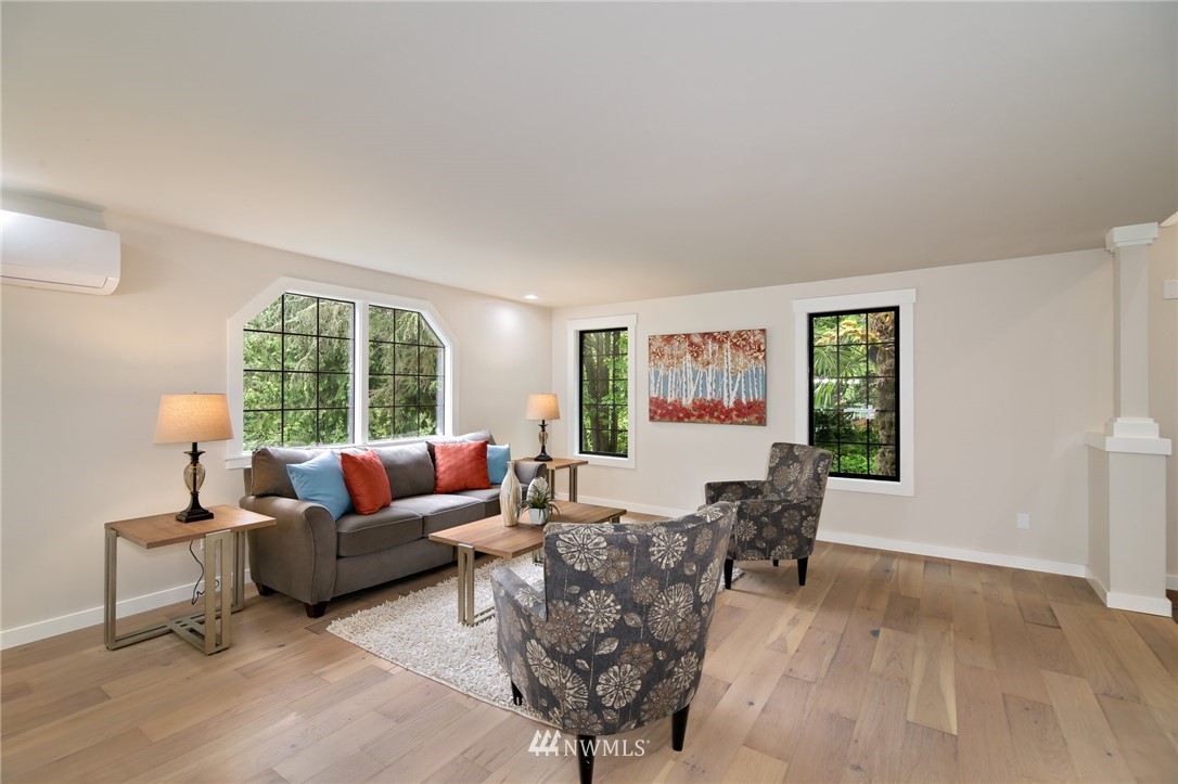 28505 Northeast Tolt Hill Road Carnation, WA 98014 - Photo 8 of 25 a living room with furniture and a large window