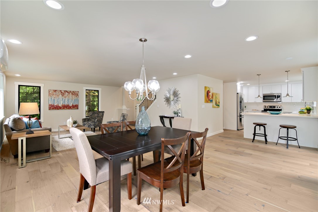 28505 Northeast Tolt Hill Road Carnation, WA 98014 - Photo 10 of 25 a view of a dining room with furniture and chandelier