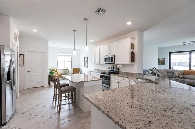 a large kitchen with cabinets