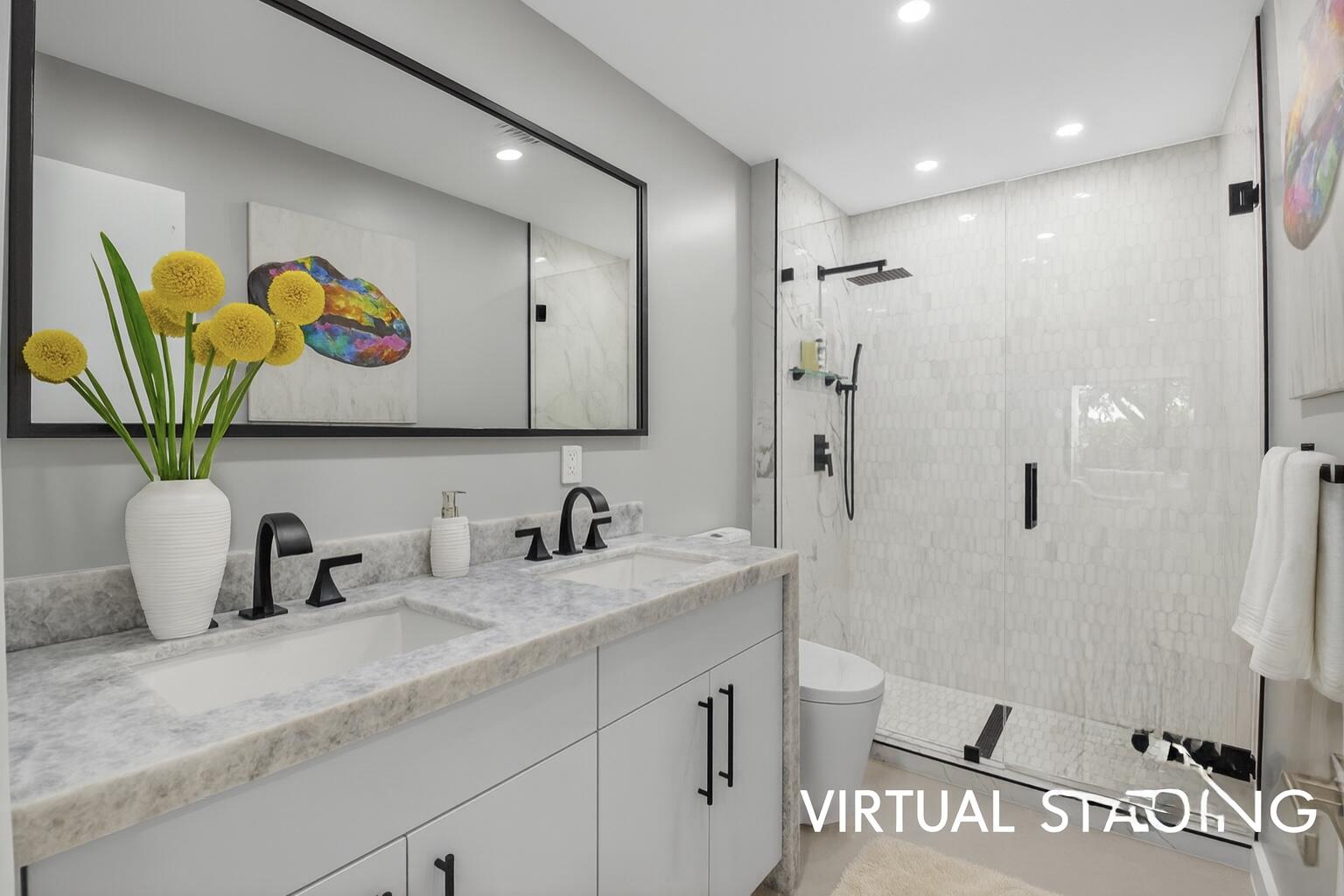 7847 Lakeside Boulevard, Unit 1014 Boca Raton, FL 33434 - Photo 25 of 53 a bathroom with a sink a toilet and a shower