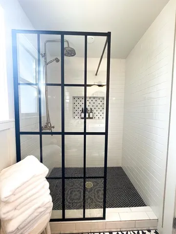 a bathroom with a sink and a window