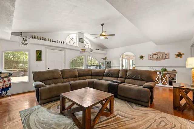 a living room with furniture and a window