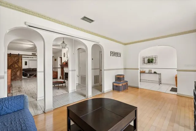a kitchen with stainless steel appliances granite countertop a sink and a refrigerator