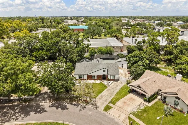 an aerial view of a house with a garden