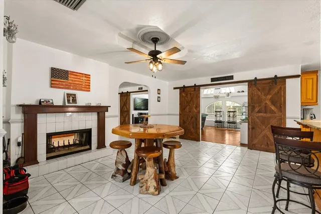 a view of a livingroom with furniture and a fireplace