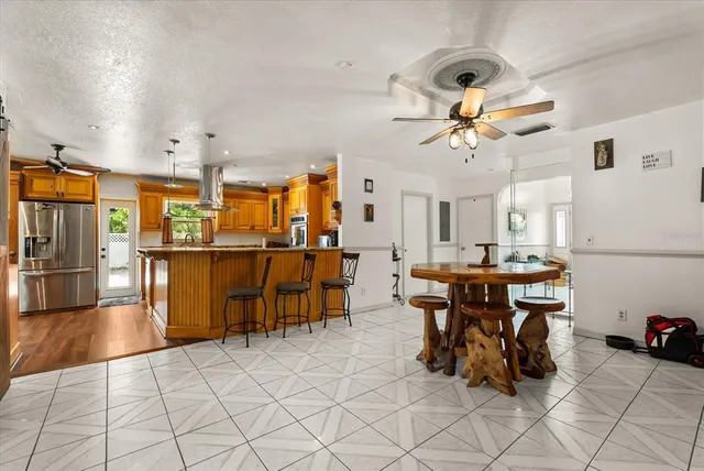 a view of a dining room with furniture