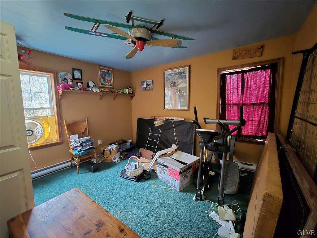 21 Ash Lane Andreas, PA 18211 - Photo 12 of 13 a room with furniture a air conditioner vent and a window