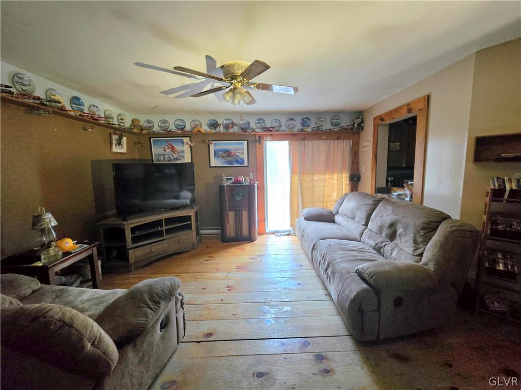 21 Ash Lane Andreas, PA 18211 - Photo 6 of 13 a living room with furniture and a flat screen tv