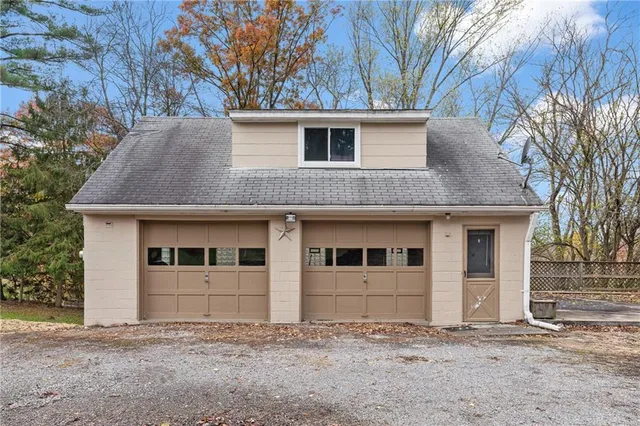 a front view of a house with windows