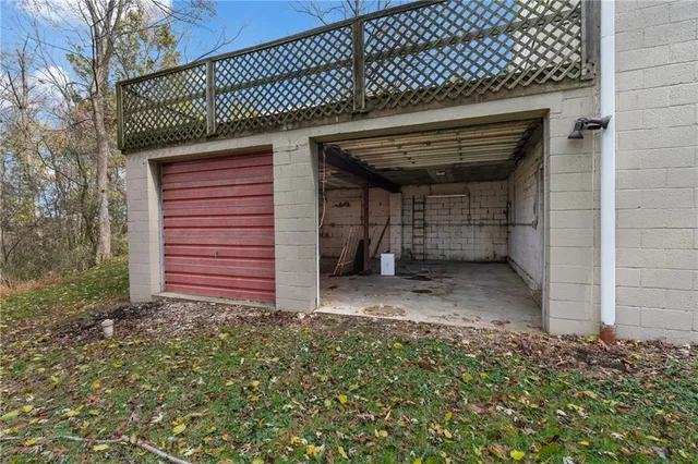 a view of a wooden door of the house