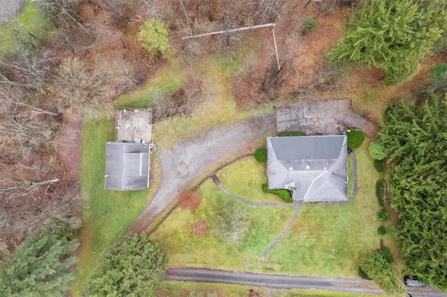 a bird view of house with outdoor space