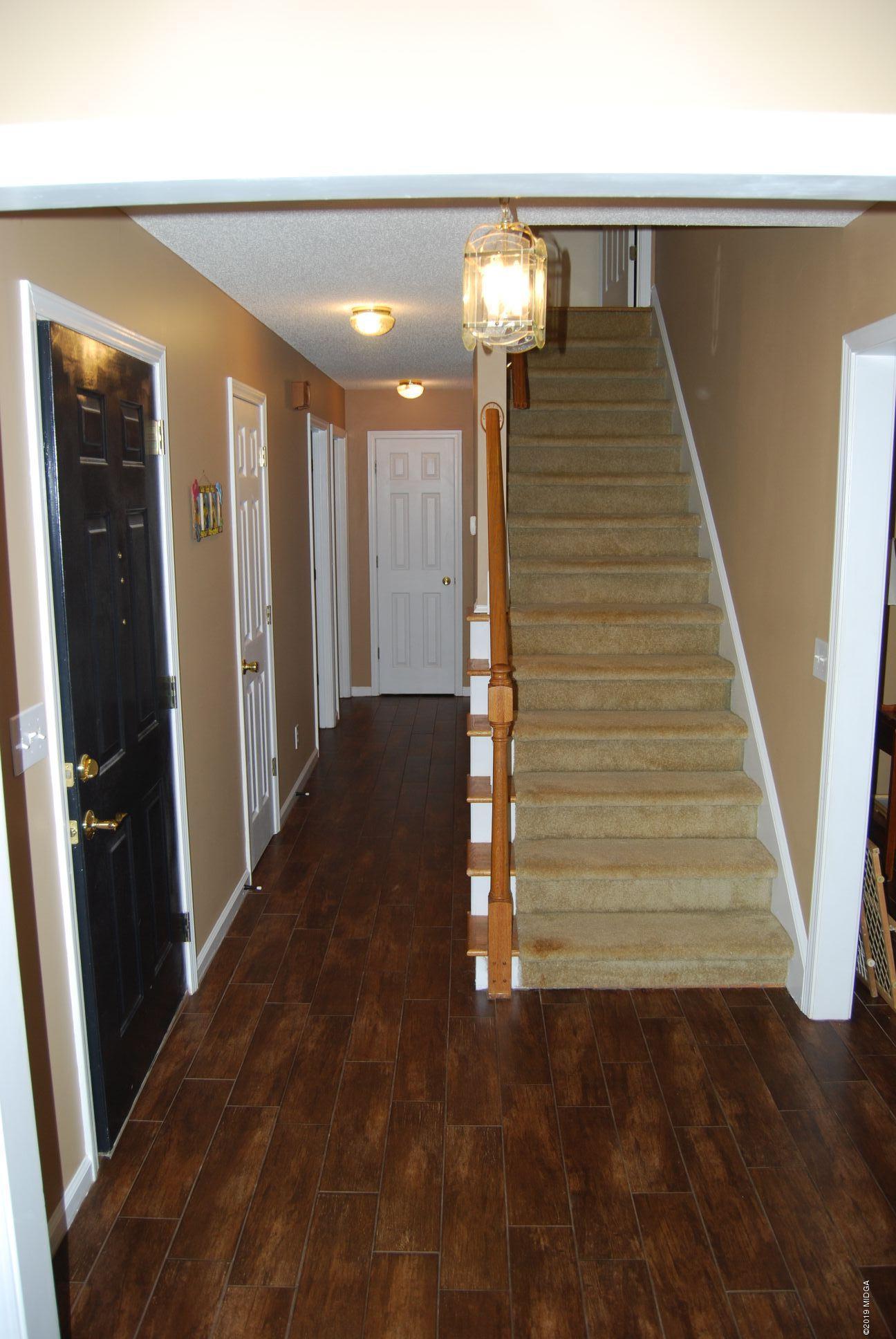 113 Marcar Road Macon, GA 31216 - Photo 16 of 31 a view of entryway and hall with wooden floor