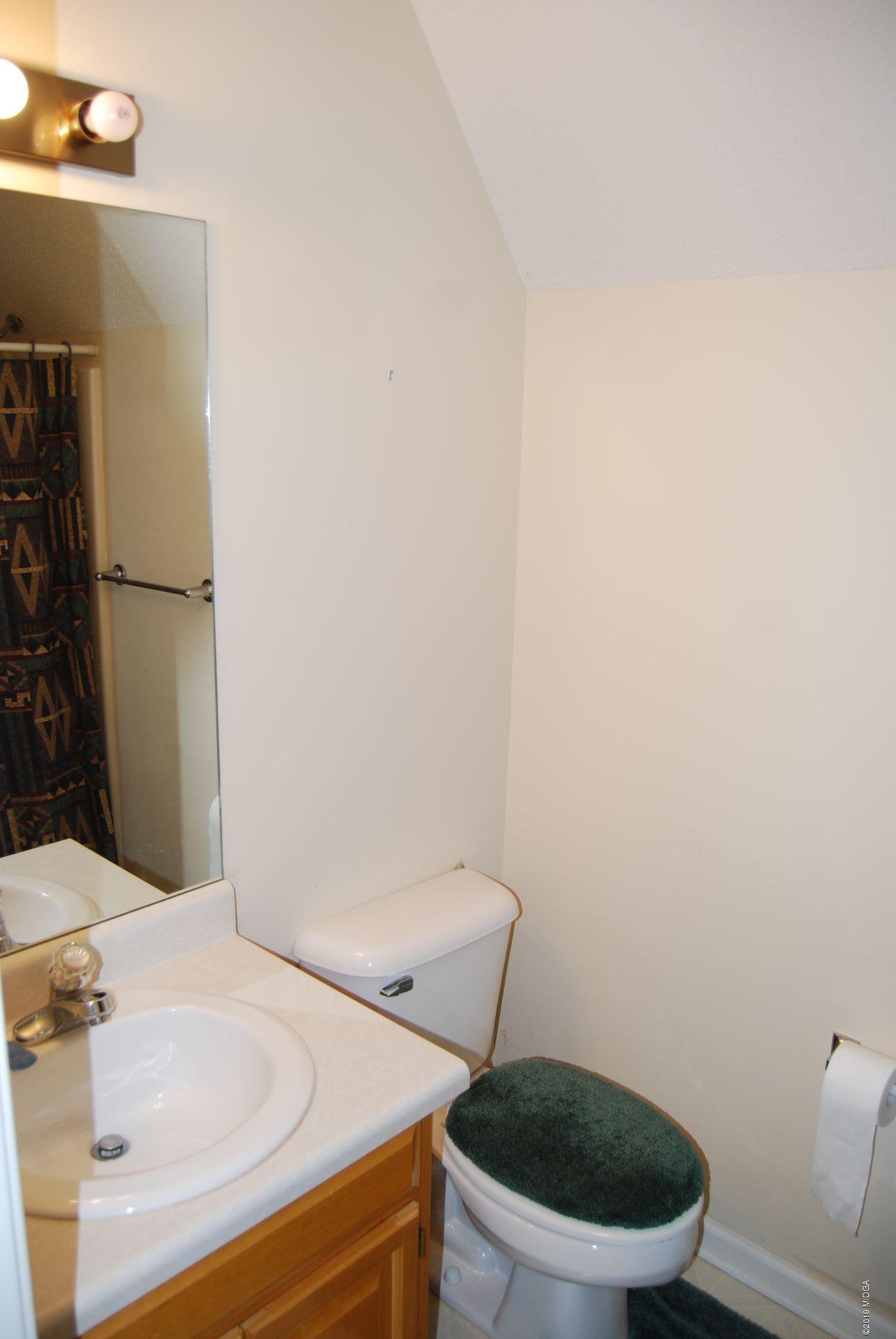 113 Marcar Road Macon, GA 31216 - Photo 18 of 31 a bathroom with a sink and a toilet