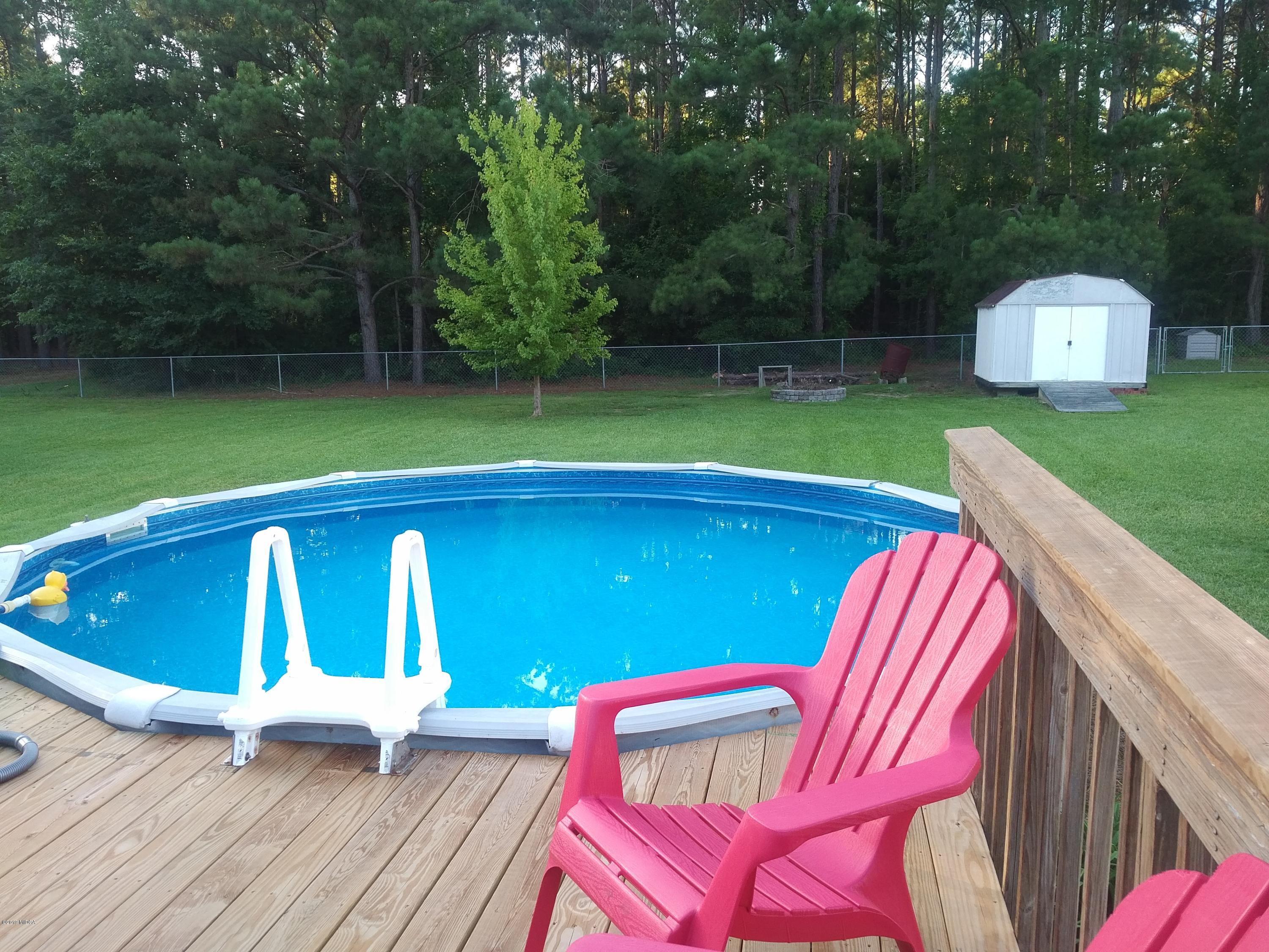 113 Marcar Road Macon, GA 31216 - Photo 22 of 31 a view of a two chairs in the roof deck