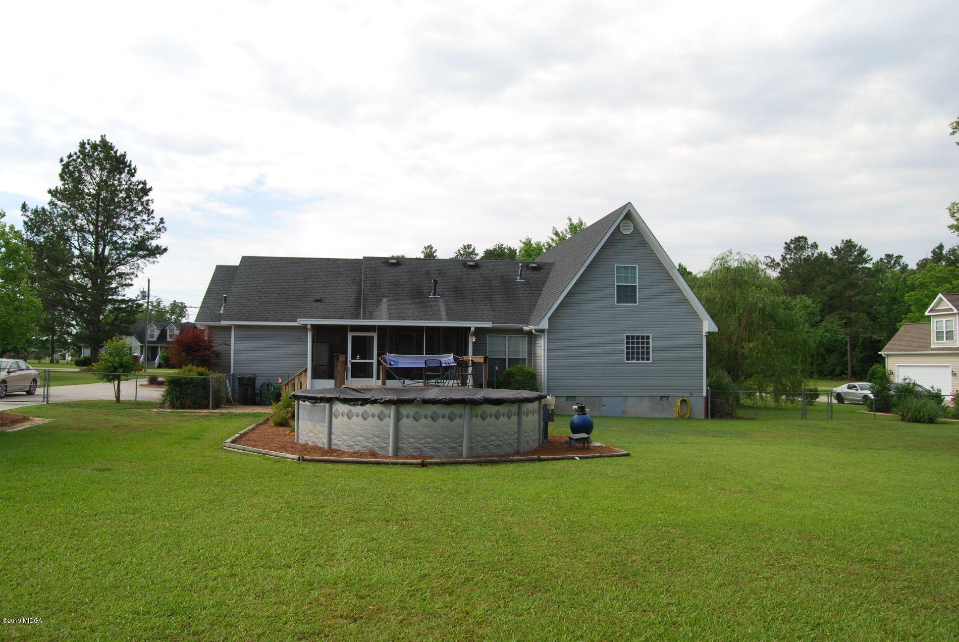 113 Marcar Road Macon, GA 31216 - Photo 23 of 31 a view of a house with backyard and garden