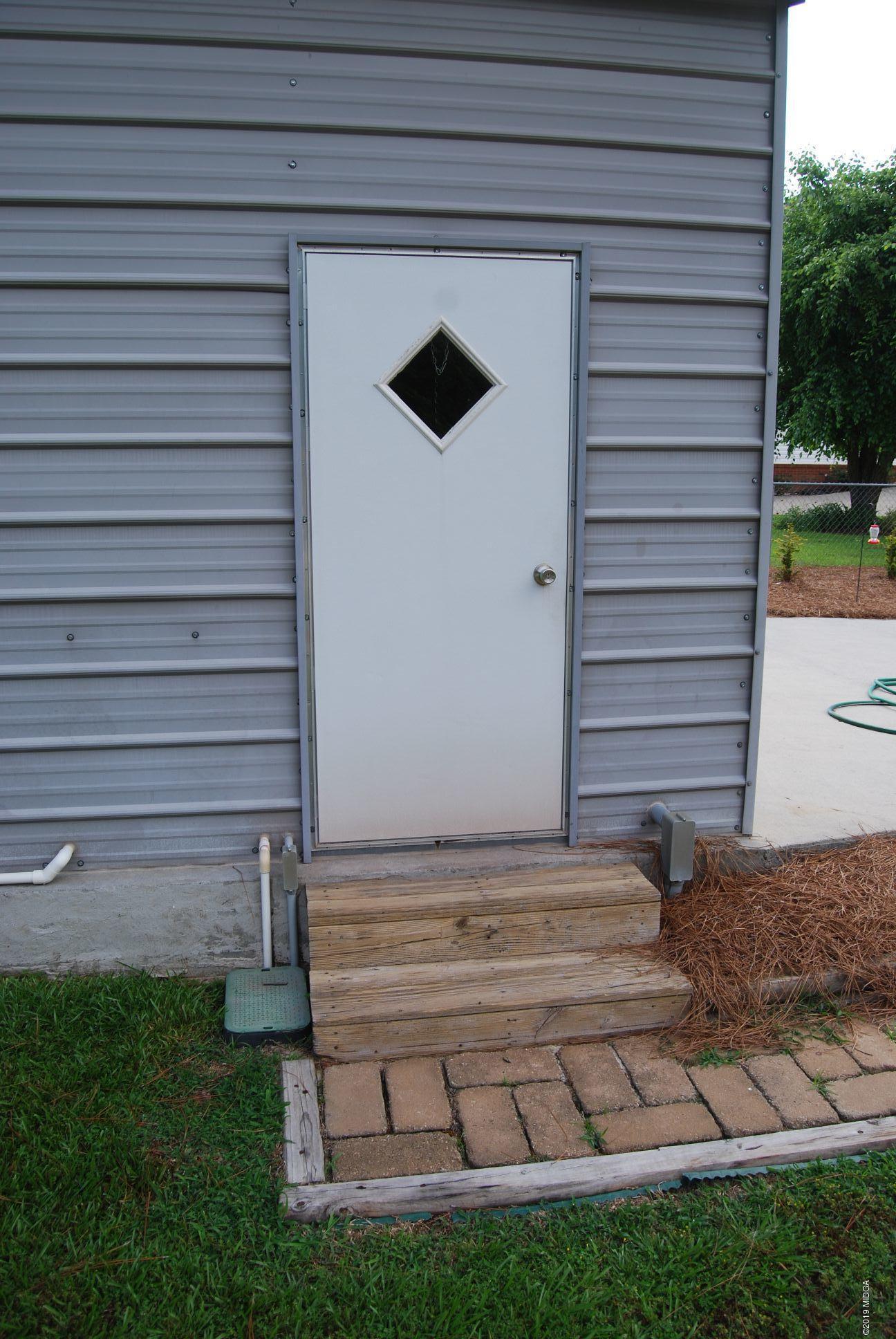 113 Marcar Road Macon, GA 31216 - Photo 26 of 31 a view of backyard of a house