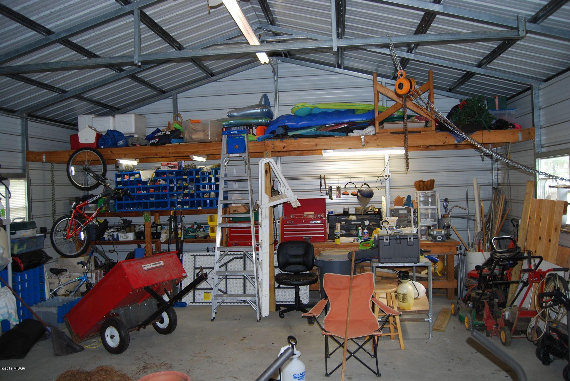 113 Marcar Road Macon, GA 31216 - Photo 29 of 31 a view of a storage in a room