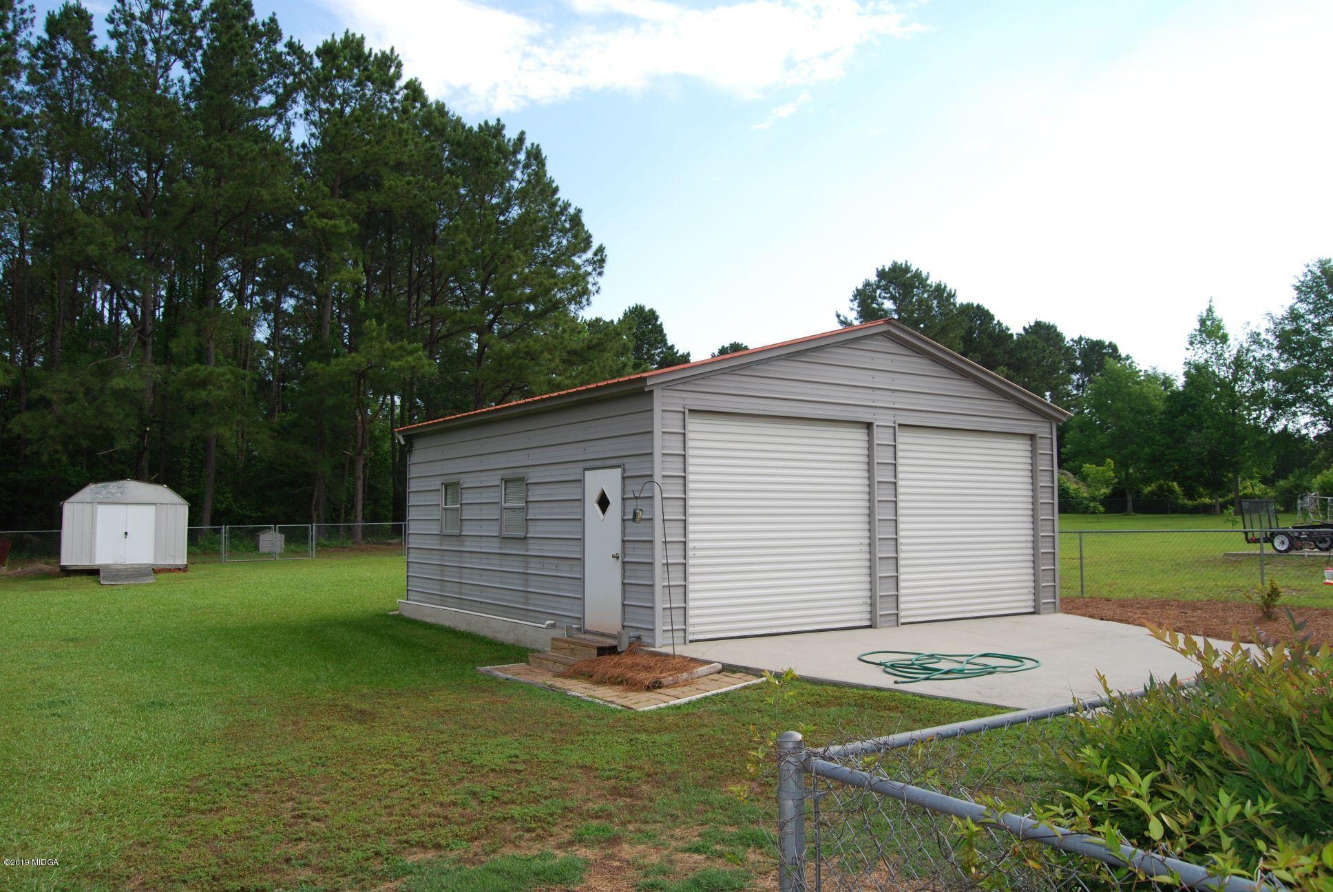 113 Marcar Road Macon, GA 31216 - Photo 30 of 31 a front view of a house with garden