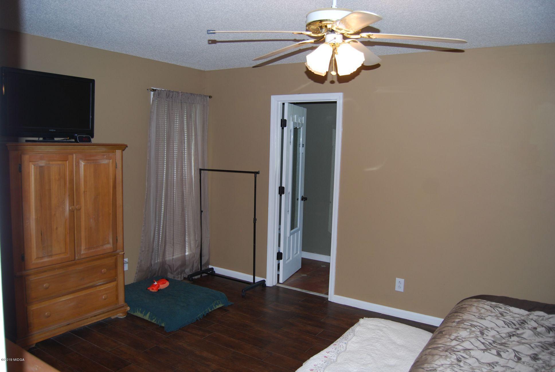 113 Marcar Road Macon, GA 31216 - Photo 9 of 31 a view of a livingroom with wooden floor