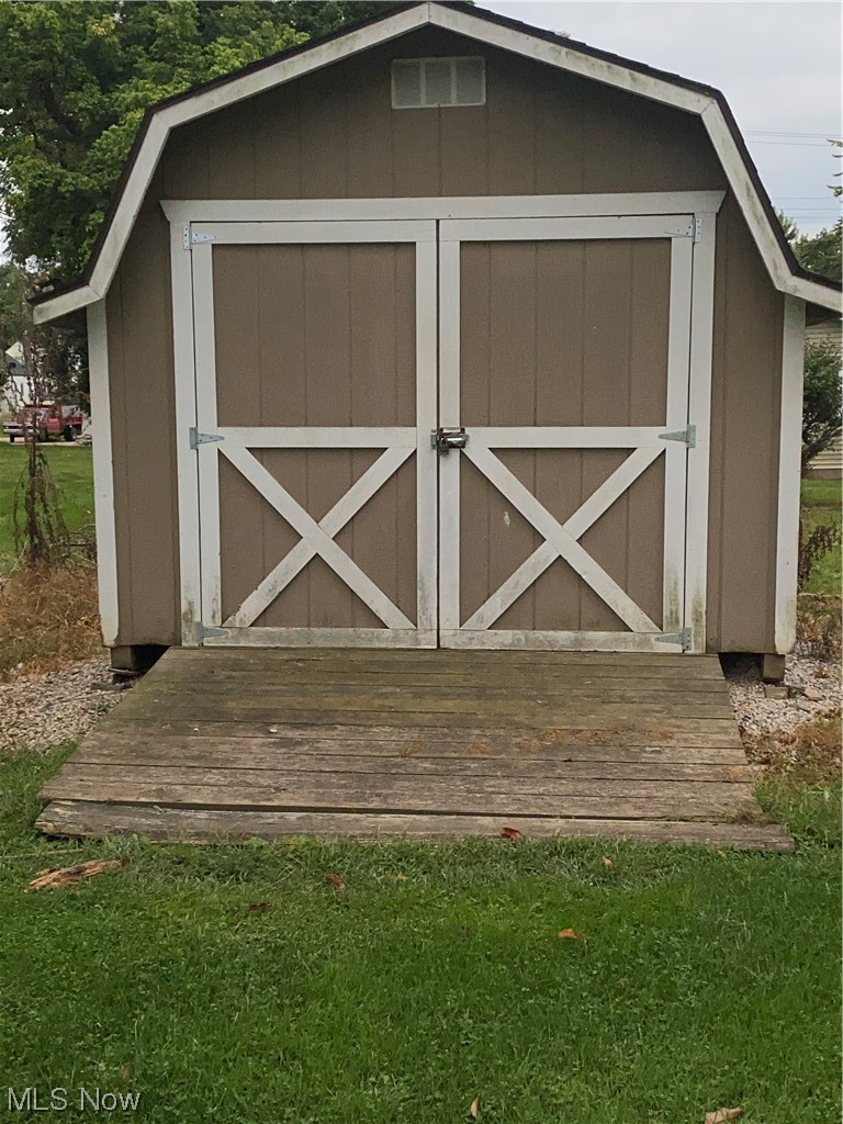 1518 Walnut Road Southwest Massillon, OH 44647 - Photo 22 of 26 View of shed / structure with a yard