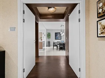a view of a kitchen with furniture and a ceiling fan