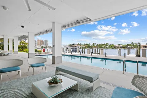 a view of a chairs and table in a terrace