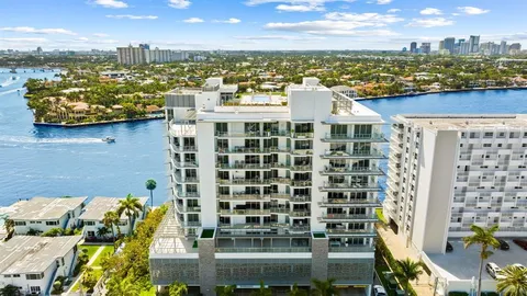 a front view of a building with outdoor seating