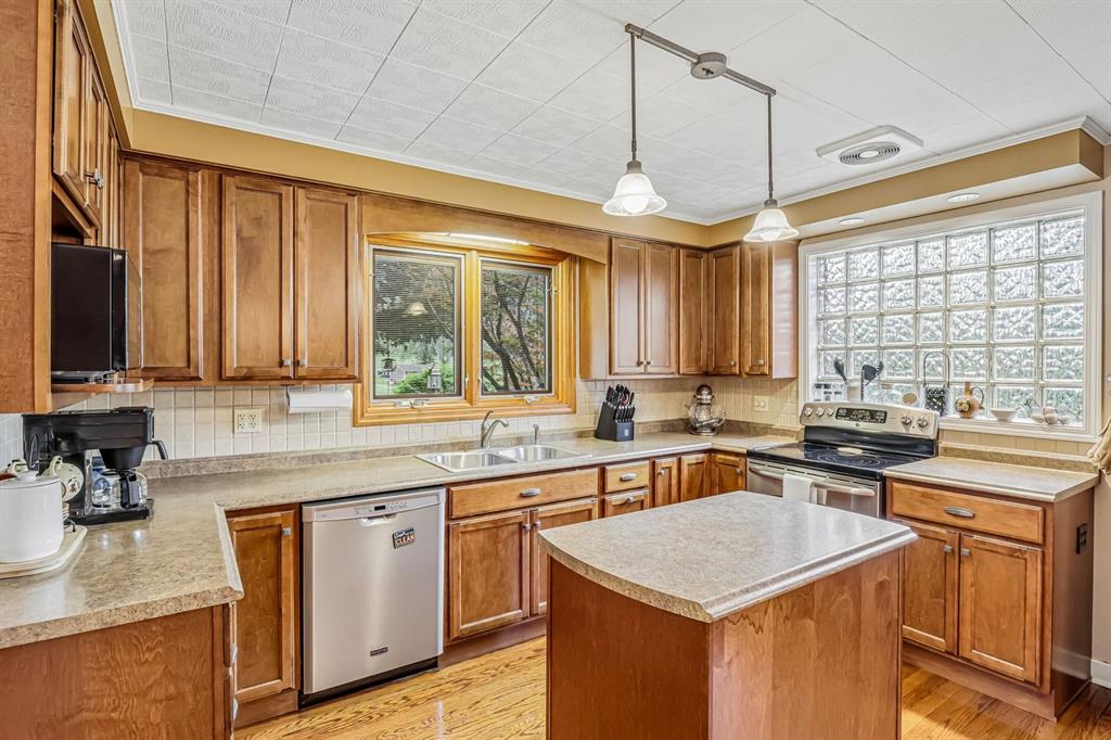529 Utopia Road Apollo, PA 15613 - Photo 17 of 50 a kitchen with a sink stove top oven and refrigerator