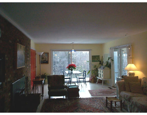 237 North Valley Road Pelham, MA 01002 - Photo 2 of 5 a living room with furniture and a flat screen tv