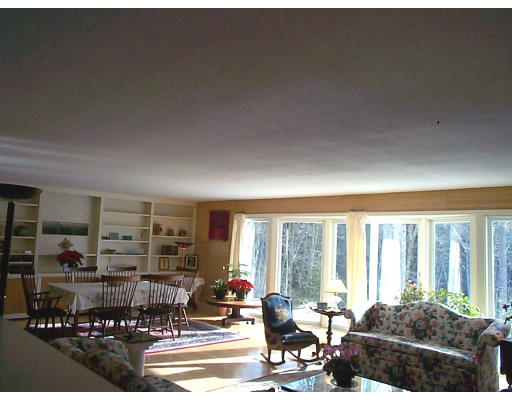 237 North Valley Road Pelham, MA 01002 - Photo 4 of 5 a living room with furniture and a large window