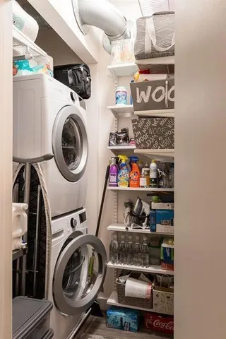 a bedroom with a bed and a lamp