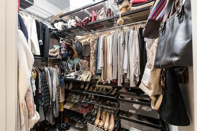 a view of a patio with table and chairs potted plants with wooden fence