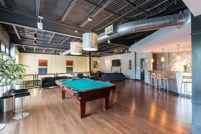a view of a chairs and table in a patio