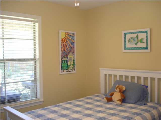 87 Indian Woman Road Santa Rosa Beach, FL 32459 - Photo 7 of 14 a bedroom with a bed and window
