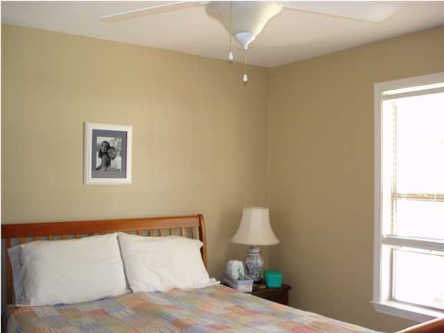 87 Indian Woman Road Santa Rosa Beach, FL 32459 - Photo 8 of 14 a bedroom with a bed and a window