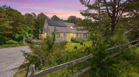 a view of a small yard from a balcony