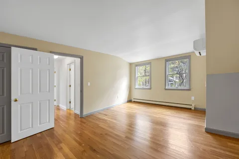 an empty room with windows
