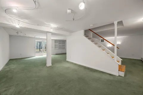 a view of a big room with a fireplace