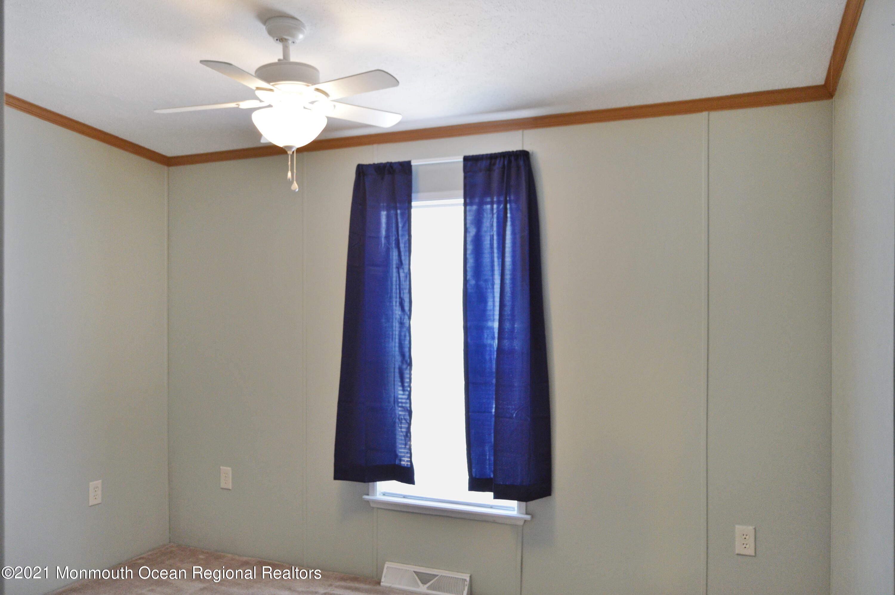 50 Roberts Road Toms River, NJ 08755 - Photo 13 of 23 a view of a hallway with windows and chandelier