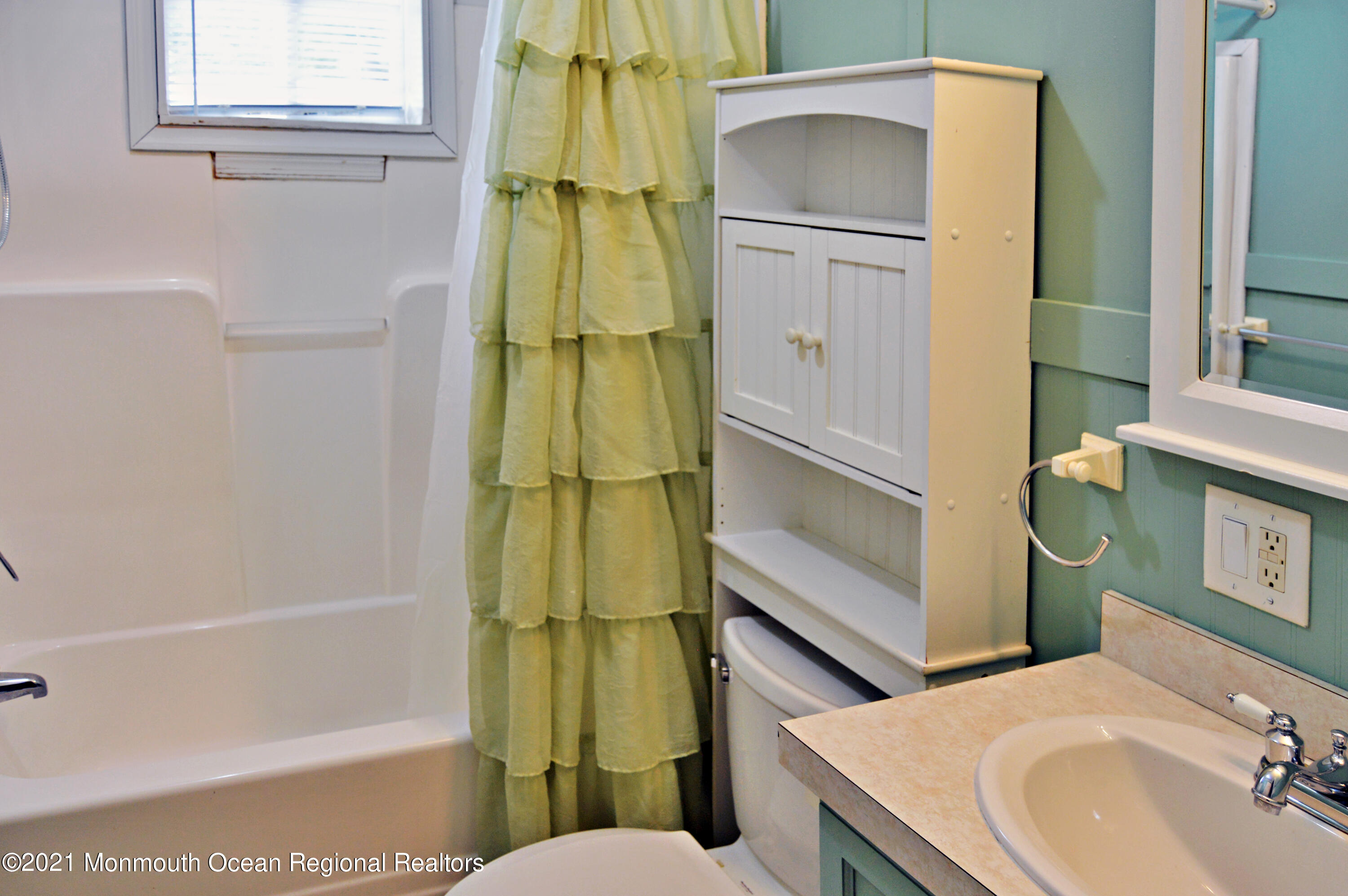 50 Roberts Road Toms River, NJ 08755 - Photo 16 of 23 a bathroom with a sink a toilet and shower