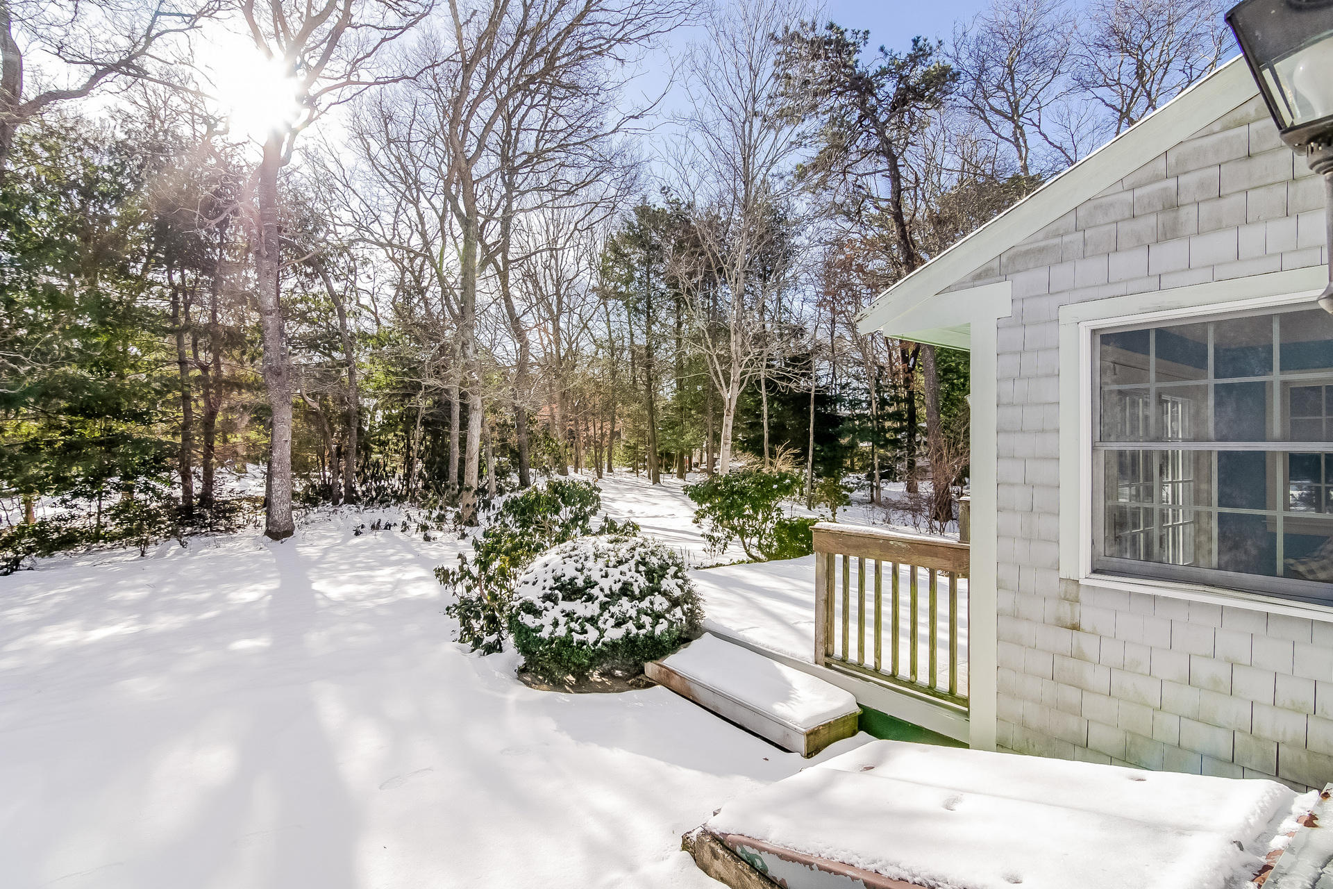 41 Oxner Road Centerville, MA 02632 - Photo 12 of 26 a view of a house with a yard and wooden fence