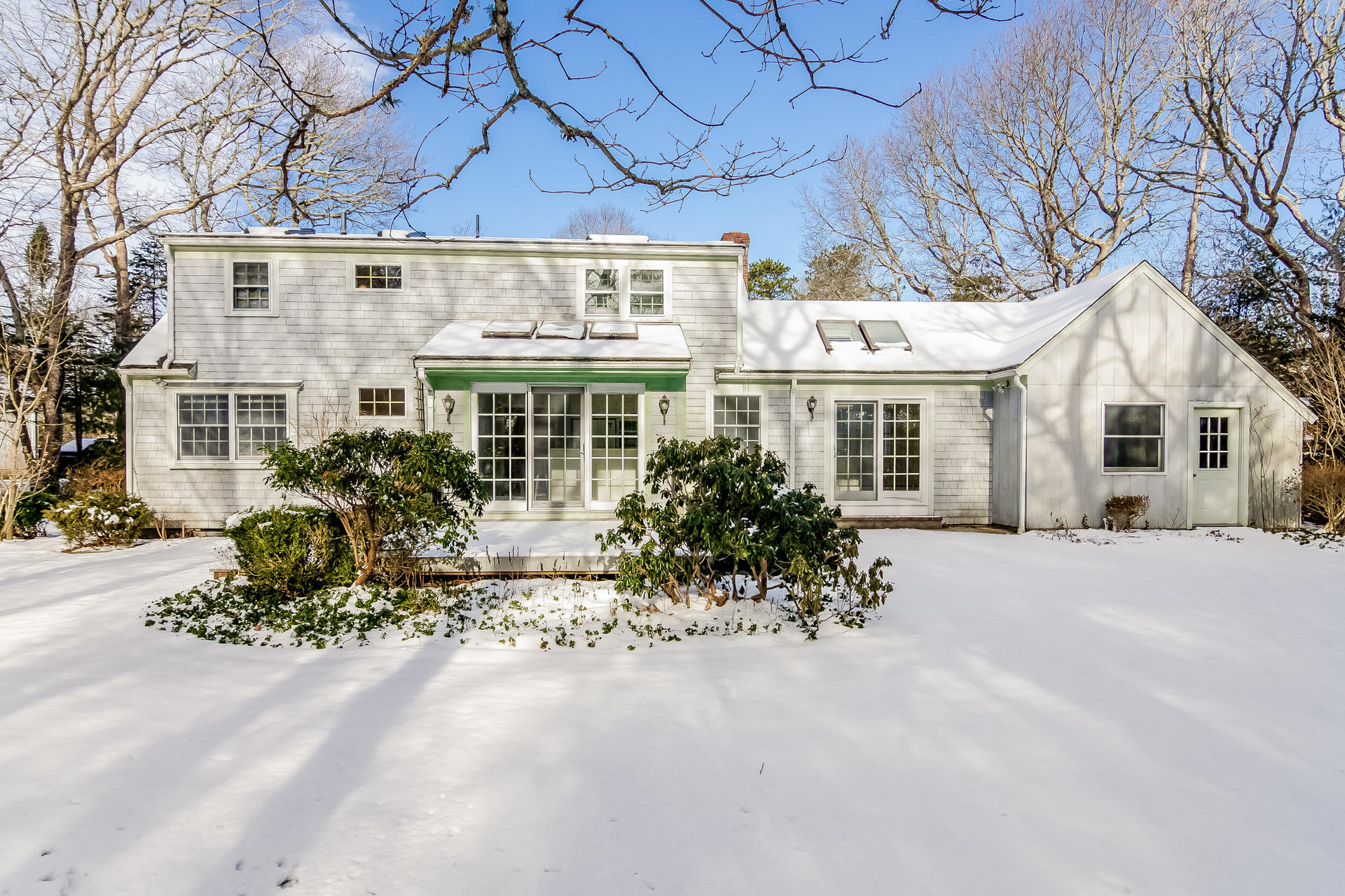 41 Oxner Road Centerville, MA 02632 - Photo 22 of 26 a front view of a house with a garden