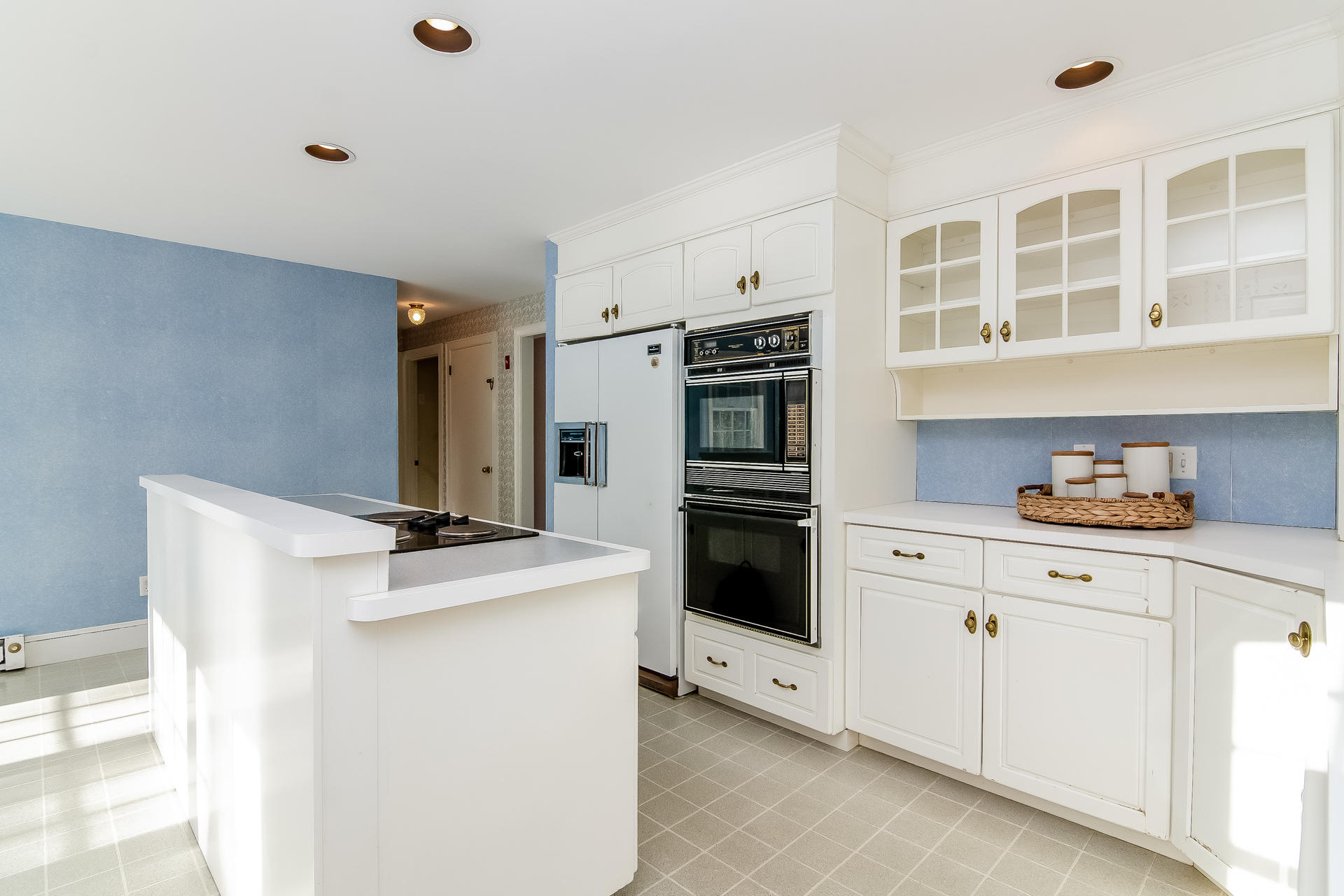 41 Oxner Road Centerville, MA 02632 - Photo 8 of 26 a kitchen with stainless steel appliances a stove refrigerator and white cabinets