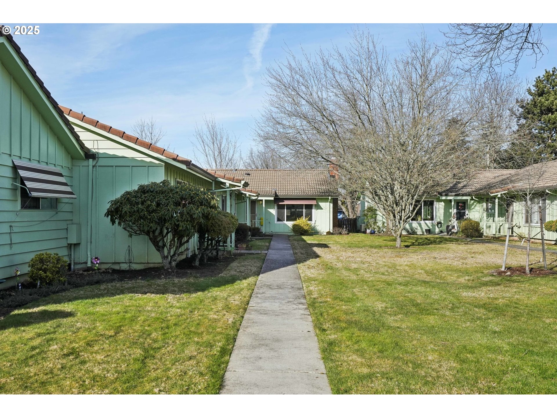 12325 Southeast Main Street Portland, OR 97233 - Photo 3 of 46 a view of a yard in front of house