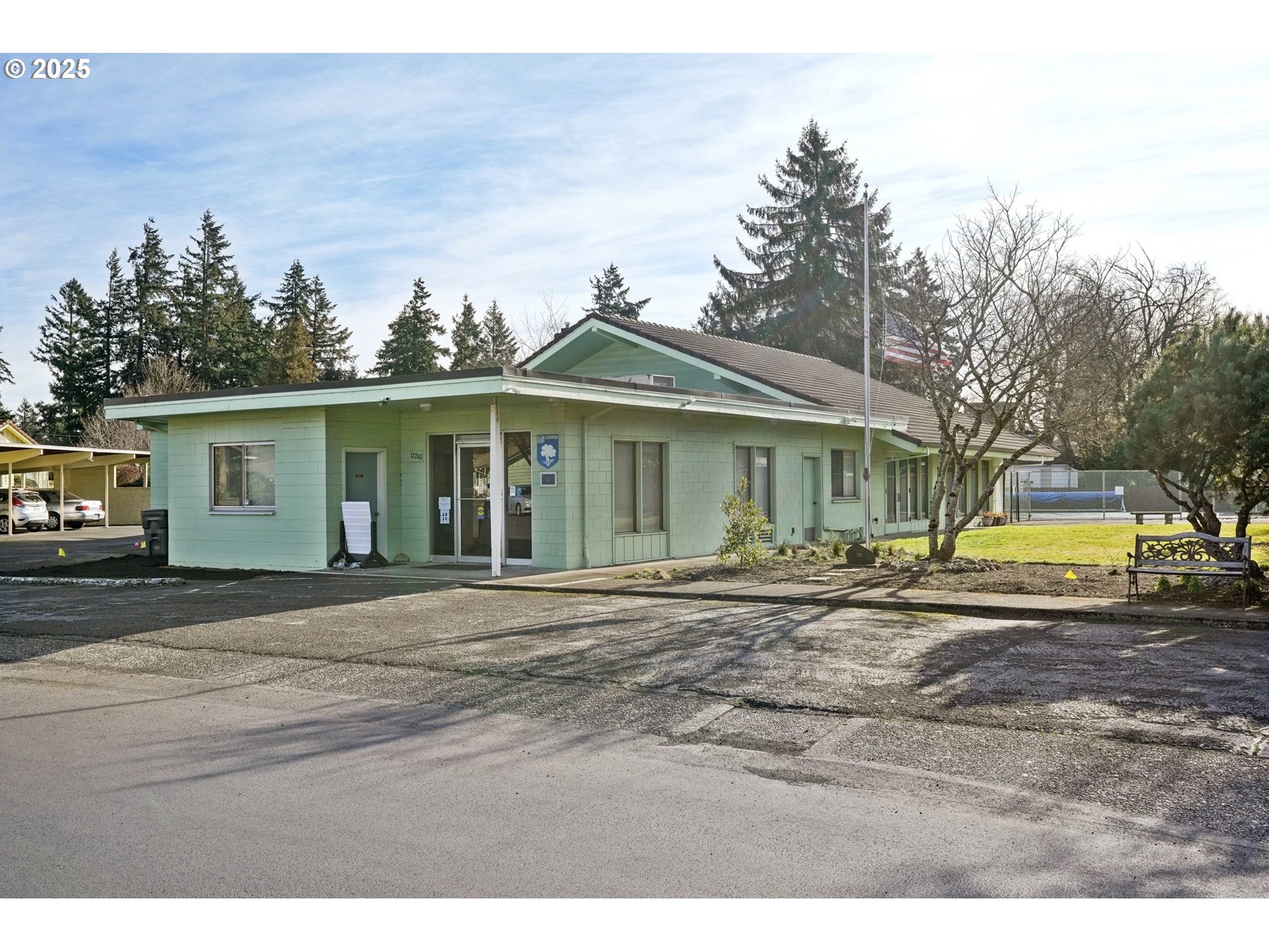 12325 Southeast Main Street Portland, OR 97233 - Photo 34 of 46 a front view of a house with a garden