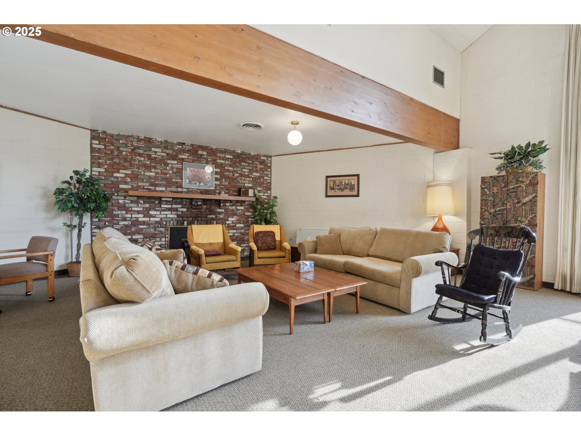 12325 Southeast Main Street Portland, OR 97233 - Photo 38 of 46 a living room with furniture and a fireplace